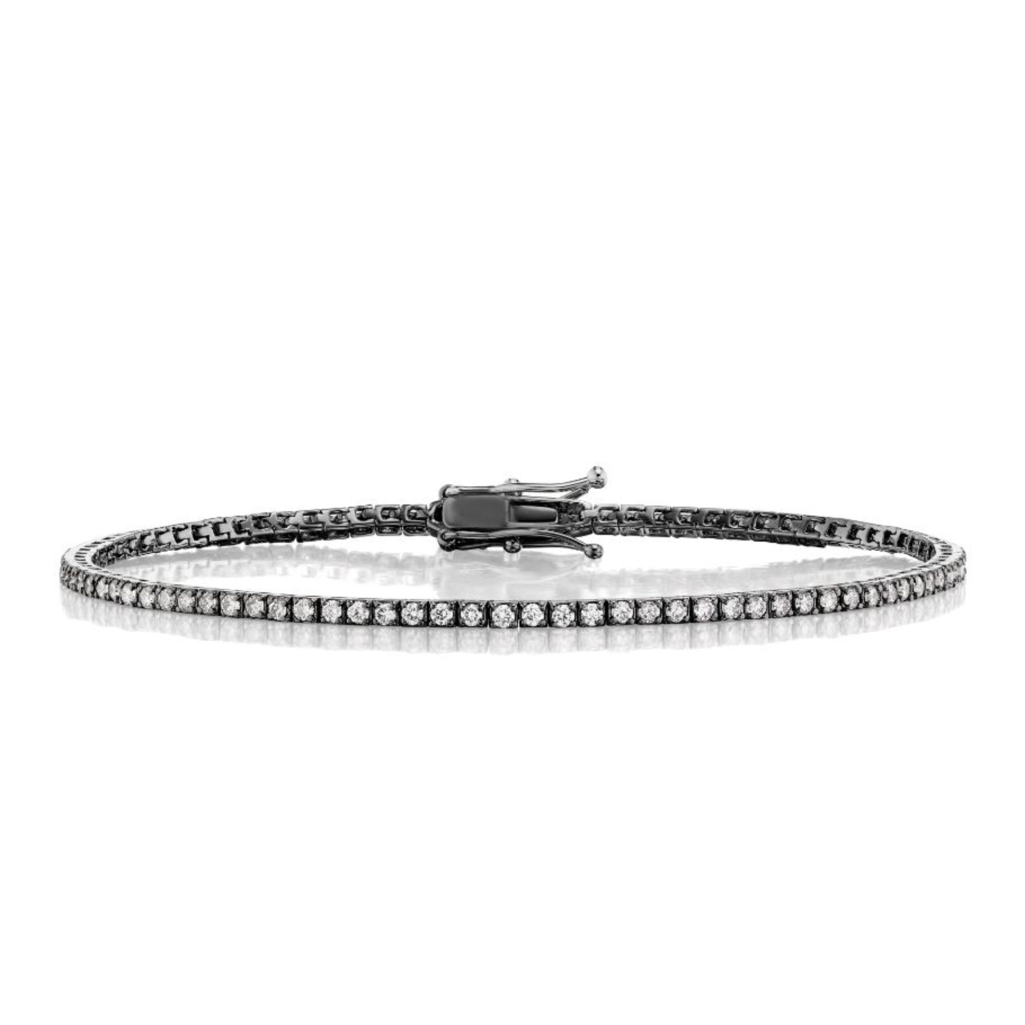The Skinny Round Brilliant Diamond Tennis Bracelet features a sleek white gold band set with round brilliant diamonds and a secure clasp, showcased on a white background.