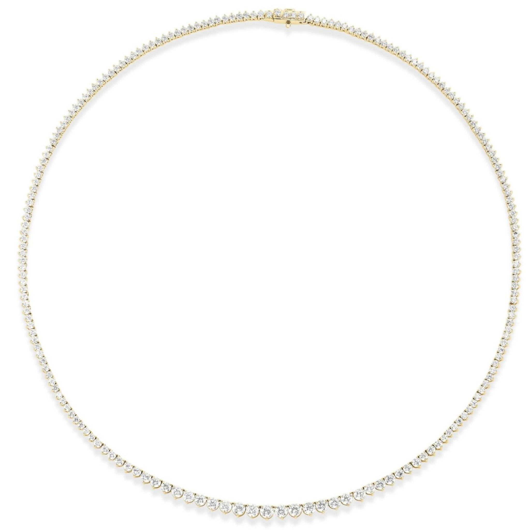 The Small Graduated Round Diamond Tennis Necklace is crafted in 18k gold with a continuous row of small, sparkling round diamonds, evenly spaced along the entire length.
