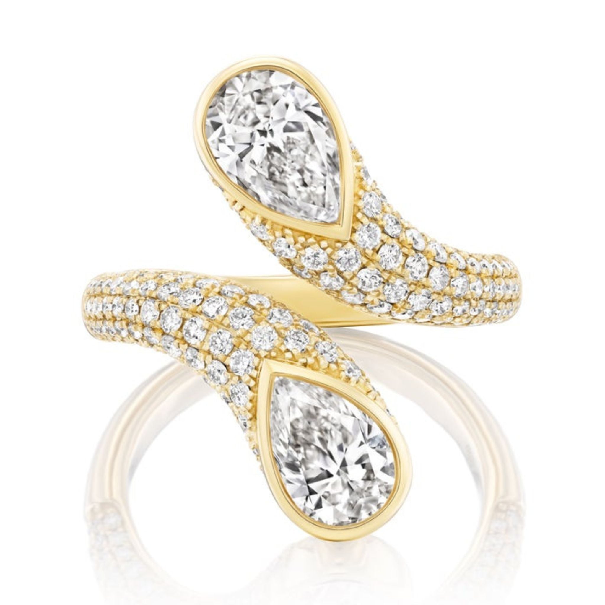 The Snake Open Space Ring in yellow gold features two overlapping bands, each tipped with a pear shape diamond and encrusted with small round diamonds for a luxurious, sparkling effect.