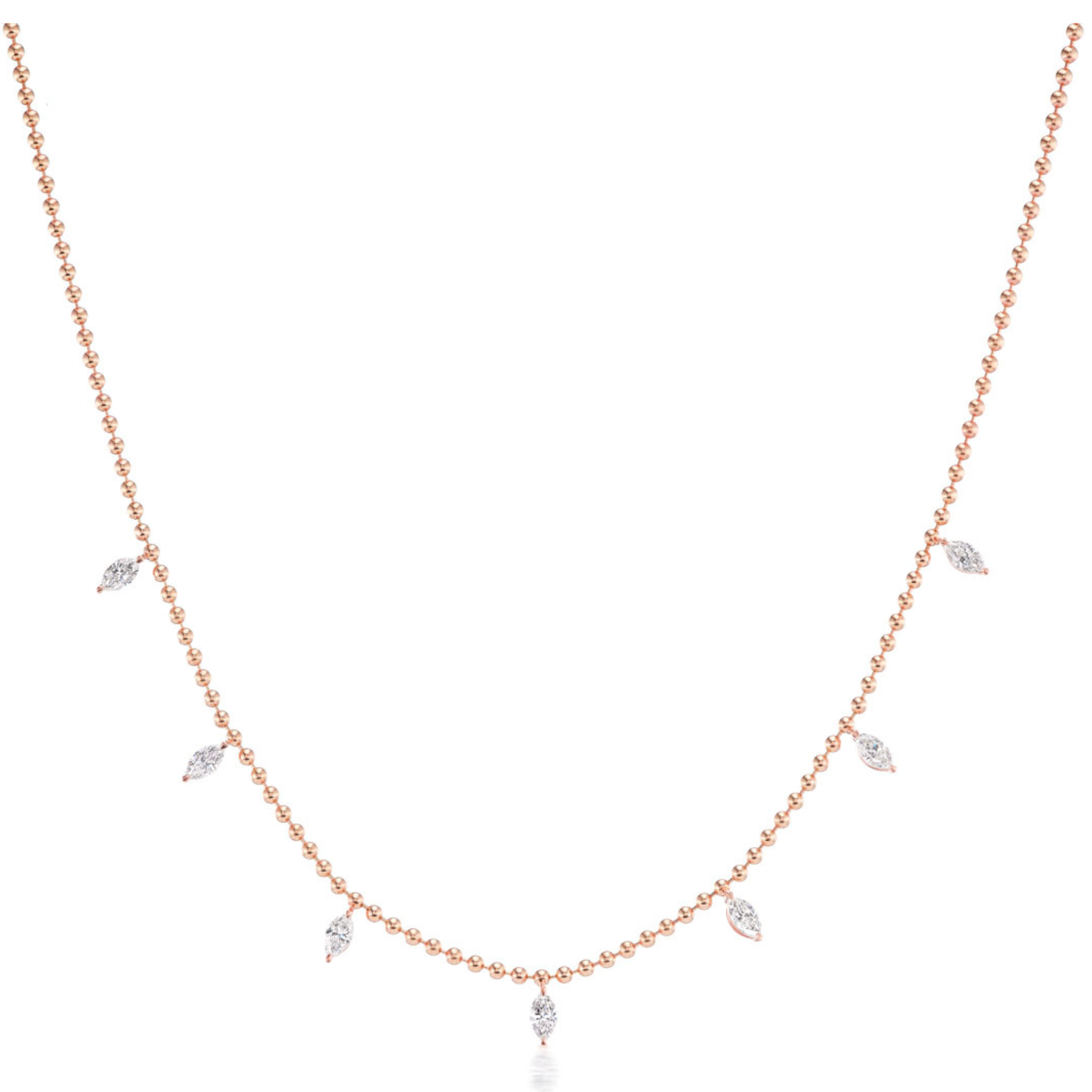 The Spike Ball Chain Necklace with Marquise Diamonds features delicate 18k gold, small round beads, and seven evenly spaced marquise-cut diamond charms along the lower half of the chain.