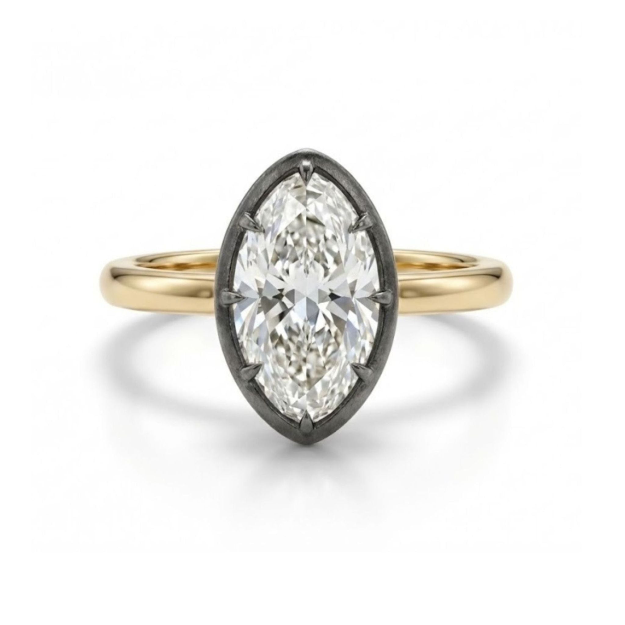 The Collet Set Marquise Diamond Solitaire Ring in Black Rhodium and Yellow Gold displays a large marquise diamond held by black rhodium prongs, shown on a white background.