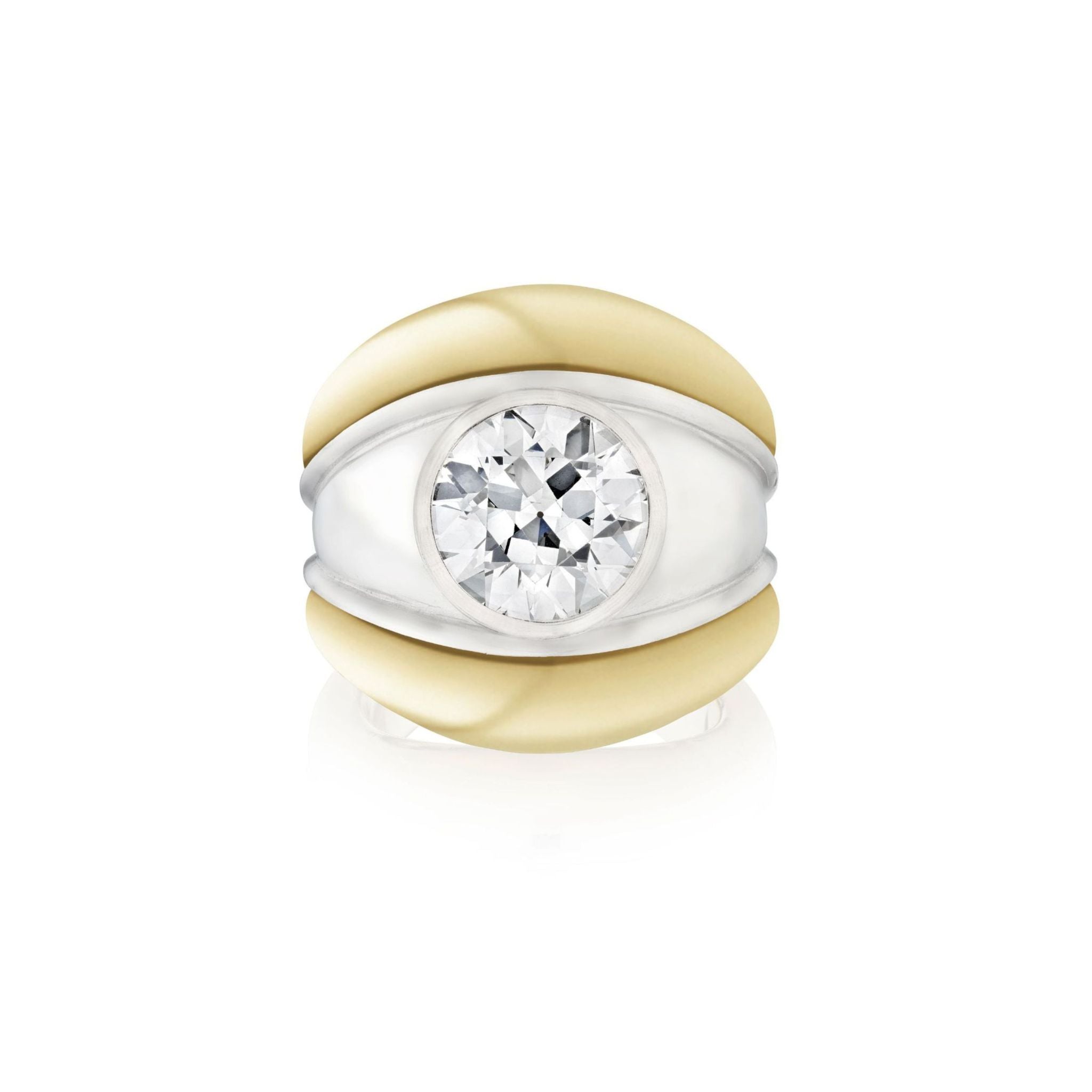 The Round Diamond Engagement Ring features a large round diamond set in the center of a wide yellow gold band accented with smooth white gold sections.