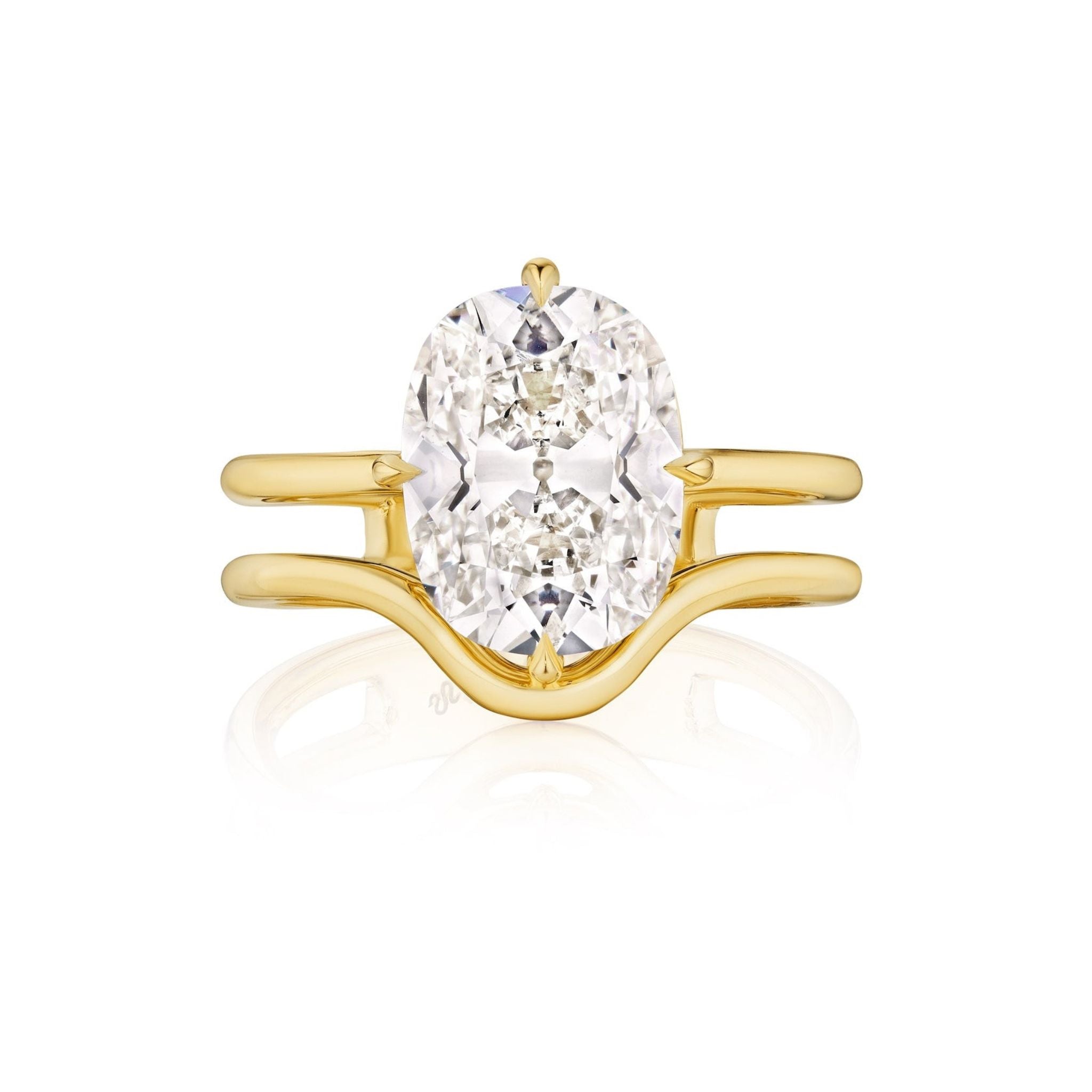 A yellow gold Double Band North-South Prong Set Cushion Cut Diamond Engagement Ring, featuring a unique double band that elegantly curves around the cushion-cut diamond centerpiece.