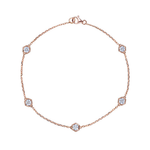 Serpentine Station Bracelet with Hexagon Bezel Set Diamonds—an elegant 18K gold bracelet showcasing five evenly spaced round diamond-like stones, each set within sleek hexagonal bezels, presented on a white background for a modern update to the classic diamond station style.