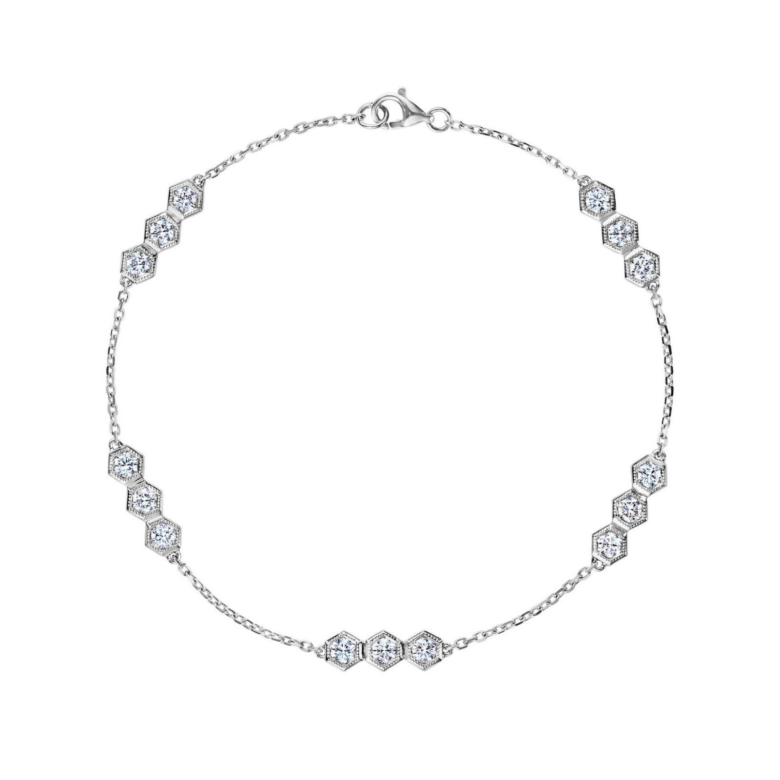 Serpentine Station Bracelet with Hexagon Diamond Trios: This elegant silver bracelet features a slender chain accented by evenly spaced stations of hexagonal settings, each set with sparkling trios of round brilliant SI1-SI2 clarity diamonds, and is finished with a secure lobster clasp closure.
