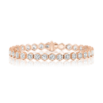 Large Hexagon Bezel Set Diamond Tennis Bracelet in 18K rose gold, featuring hexagonal links each adorned with a round brilliant diamond, displayed on a white reflective surface.