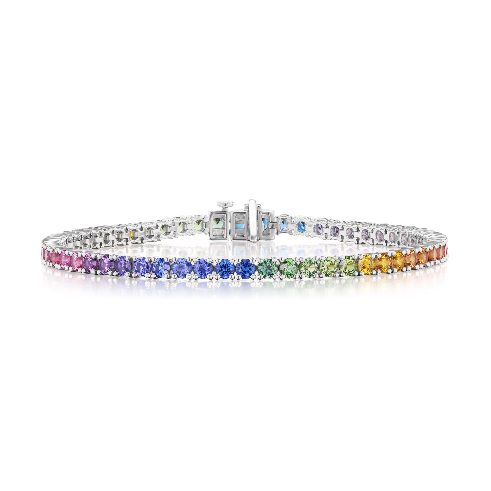 Introducing the Ombré Round Brilliant Multicolor Sapphire Tennis Bracelet, an elegant piece crafted in 18K white gold. This silver bracelet features a stunning gradient of round sapphires in rainbow hues, beautifully arranged from pink to purple, blue, green, yellow, and orange.