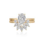 A yellow gold ring set featuring an oval-shaped central diamond, accented by round and marquise diamonds in a fan arrangement, paired with the Marquise and Round Diamond Ring Jacket in Yellow Gold.
