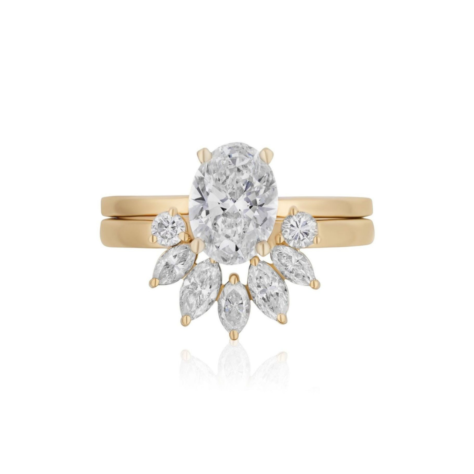 A yellow gold ring set featuring an oval-shaped central diamond, accented by round and marquise diamonds in a fan arrangement, paired with the Marquise and Round Diamond Ring Jacket in Yellow Gold.