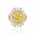 Introducing the Bezel Set Cushion Cut Yellow Diamond Ring Jacket with Pear and Emerald Cut Side Stones, showcasing a striking cushion-cut yellow diamond at its center, accented by alternating pear-shaped and emerald-cut white diamonds in a radiant sunburst design.