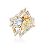 Elevate your look by pairing this gold ring—showcasing two prominent pear-shaped diamonds, one white and one yellow, encircled by geometric bands adorned with small round and baguette diamonds—with the Baguette and Round Diamond Ring Jacket in Yellow Gold for a truly striking statement.