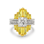 A Yellow Baguette Sapphire Ring Jacket in white gold featuring pavé diamond bands and accented with yellow baguette sapphires.