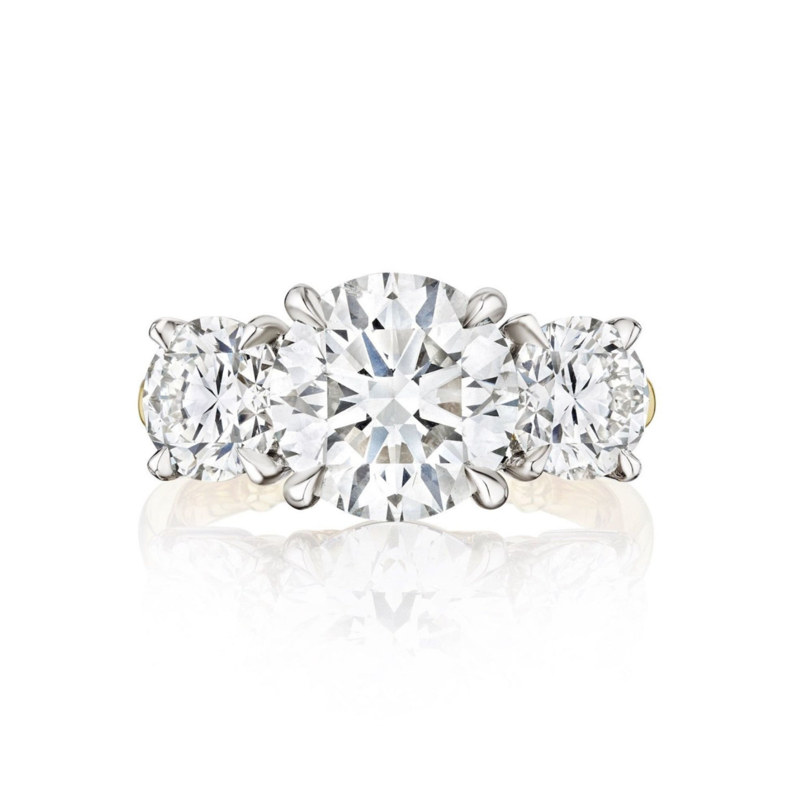 A Diamond Engagement Ring with Round Side Stones, featuring a captivating round center diamond accented by two sparkling round side stones, set in elegant platinum and yellow gold.