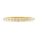 The Celestial Seeing Stars Diamond Bangle, crafted in 18k gold, showcases evenly spaced star-shaped diamond settings along its surface and is displayed against a white background.
