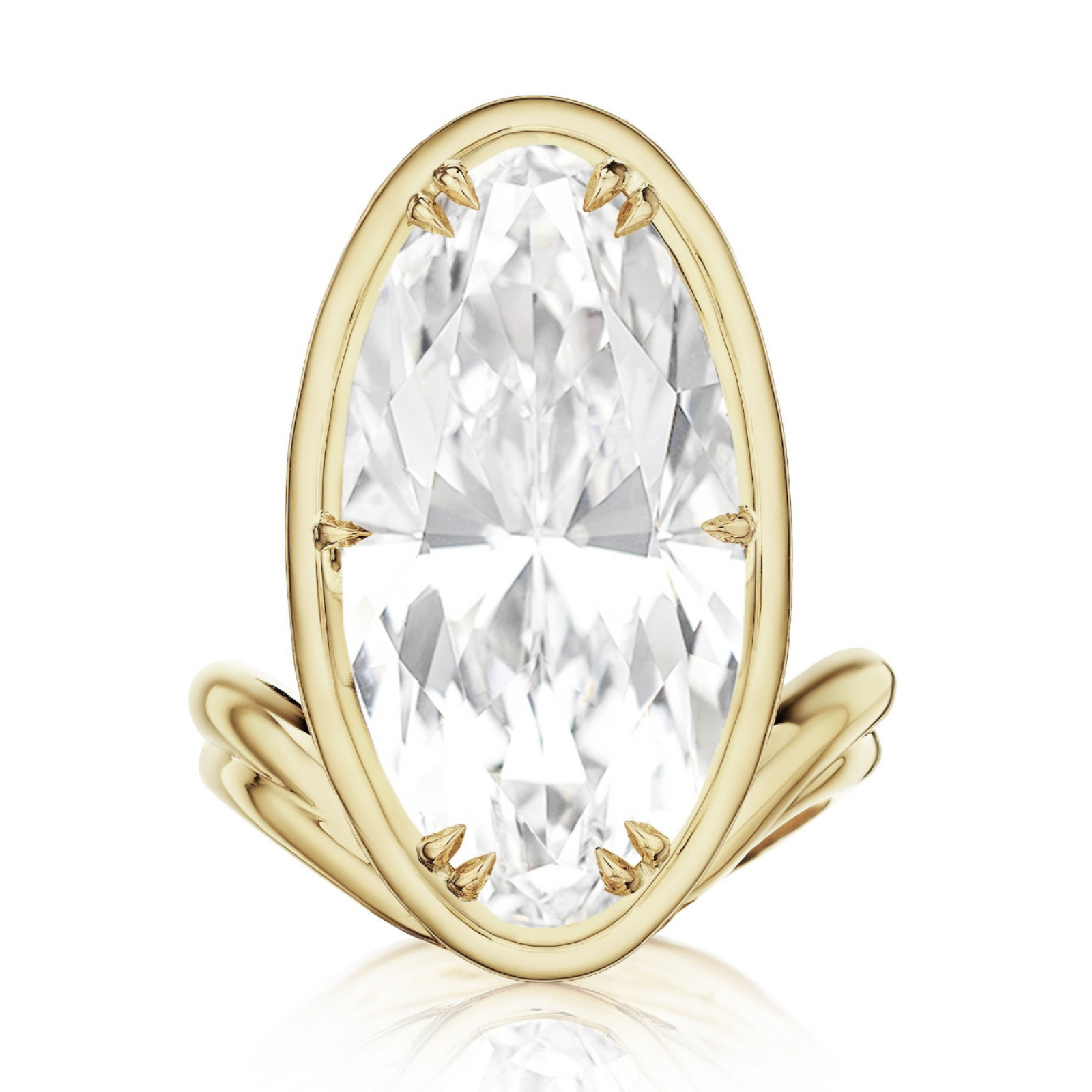 Introducing the Collet Set Elongated Oval Diamond Perch Engagement Ring in 18k Yellow Gold: This ring showcases a large vertically set elongated oval diamond, securely held by six prongs and presented from the front. The luxurious 18k yellow gold features a double band design, highlighting the elegant collet setting of this stunning engagement piece.