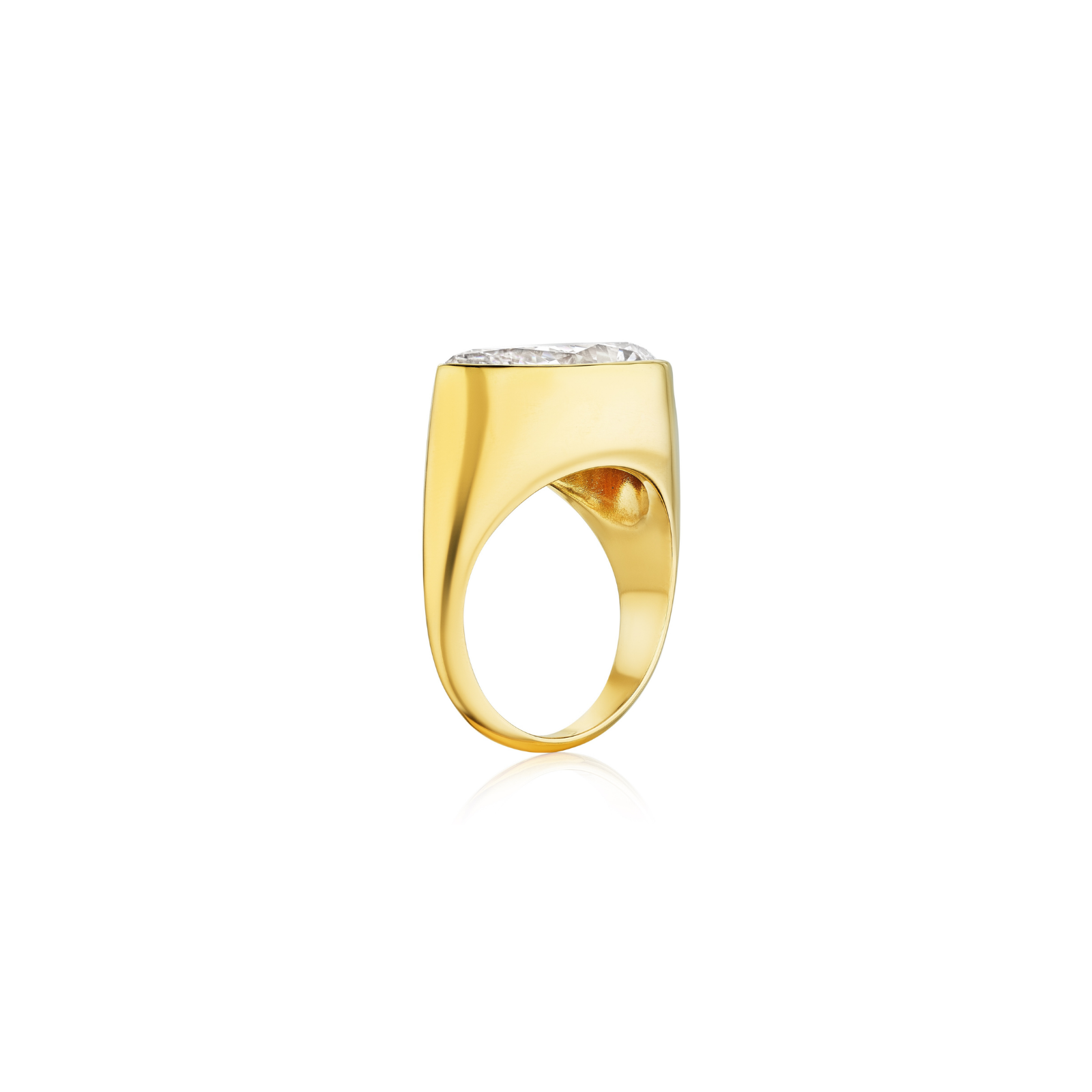 An East-West Bezel Set Pear Shape Diamond Ring in yellow gold is displayed in profile against a white background, showcasing a modern, thick band and a prominent pear-shaped diamond set horizontally on top.