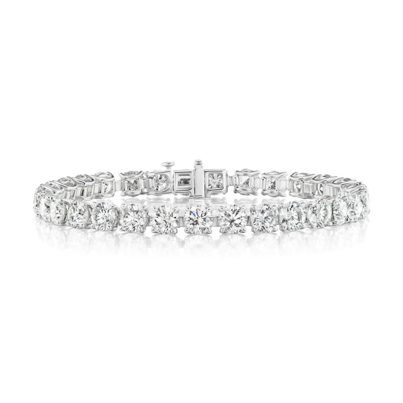 The Large Round Brilliant Diamond Tennis Bracelet in White Gold showcases round brilliant diamonds arranged in a continuous line on a refined 18K white gold band, elegantly presented against a plain white background.