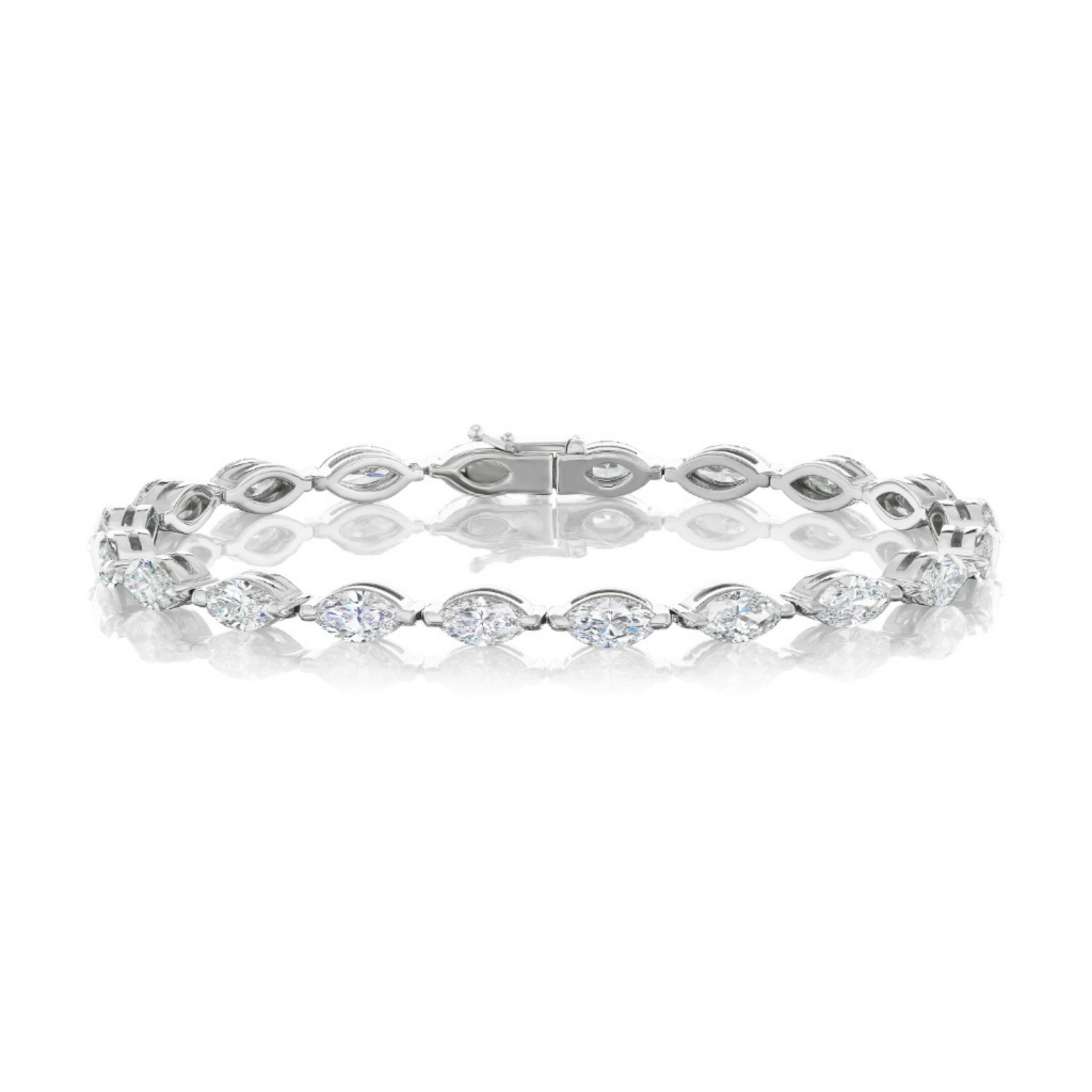 The East-West Marquise Diamond Tennis Bracelet is a silver piece showcasing marquise-cut diamonds with SI+ clarity, arranged in a repeating pattern and displayed on a white reflective surface.