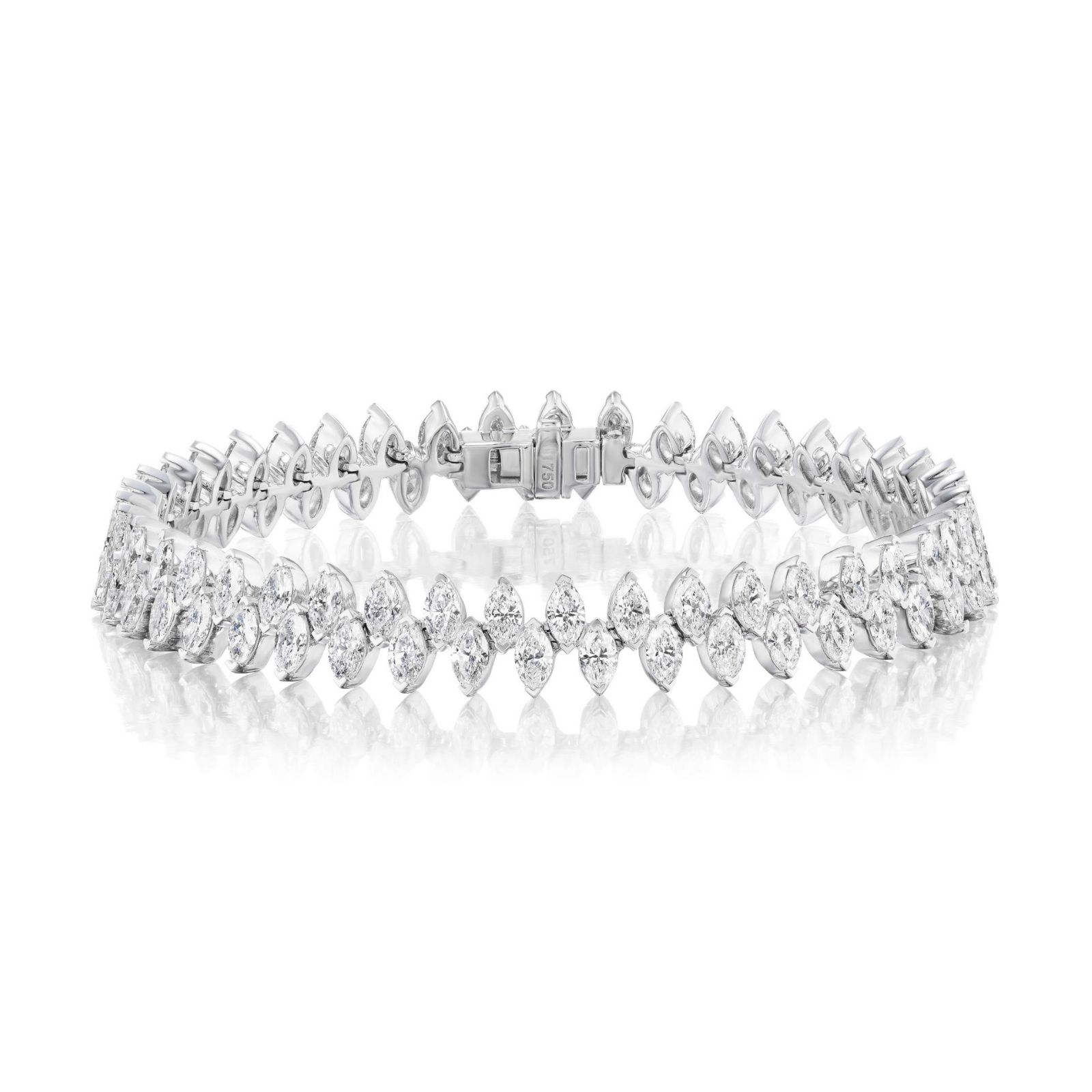 The Alternating Marquise Diamond Tennis Bracelet in White Gold features marquise-cut diamonds arranged in a symmetrical design on an 18k white gold band, displayed against a white background.