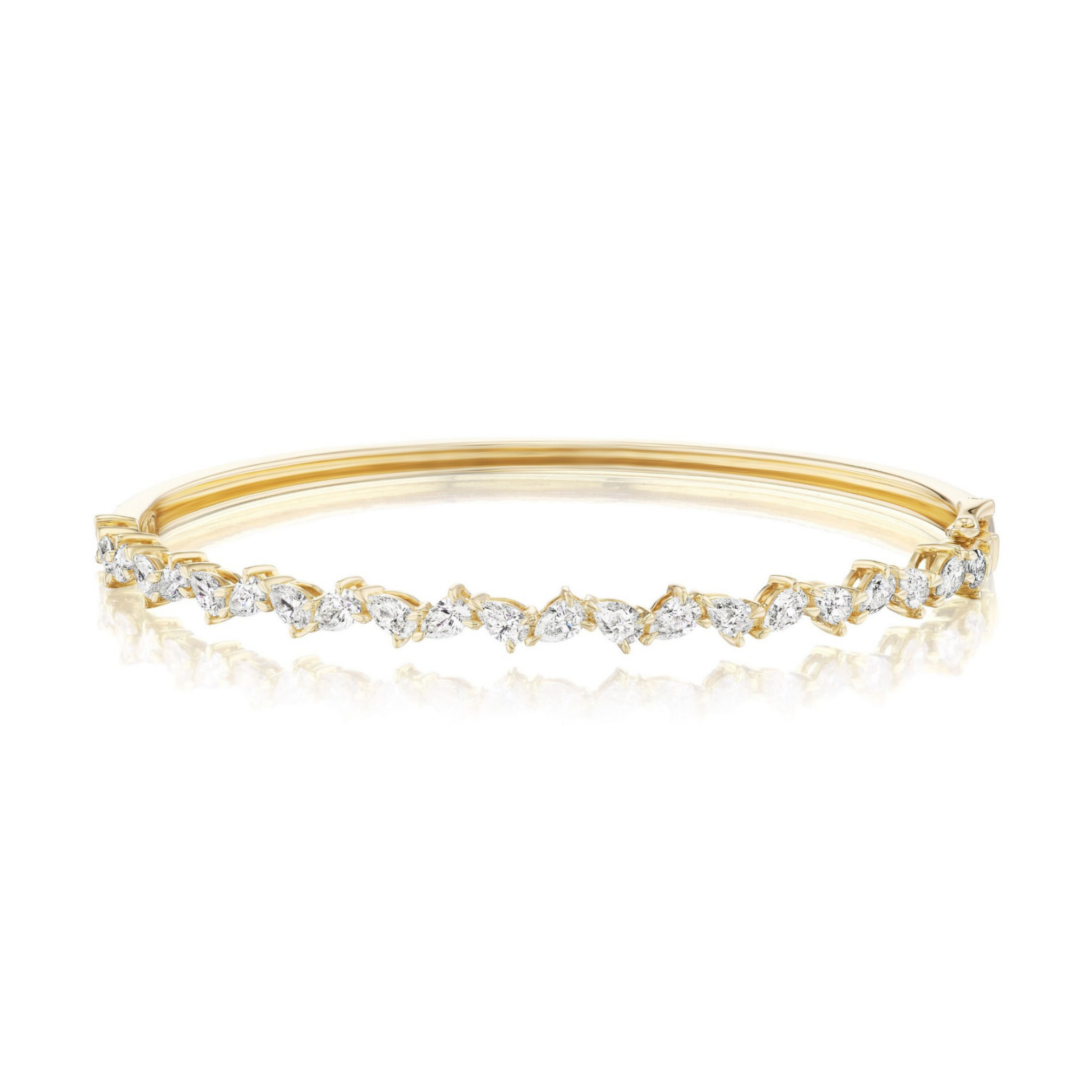 Introducing the Alternating Pear Shape Diamond Bangle in Yellow Gold—crafted from 18k yellow gold, this exquisite bracelet showcases a delicate, organic design with a row of sparkling pear-shaped white diamonds (SI clarity, G-H color) set along the top.