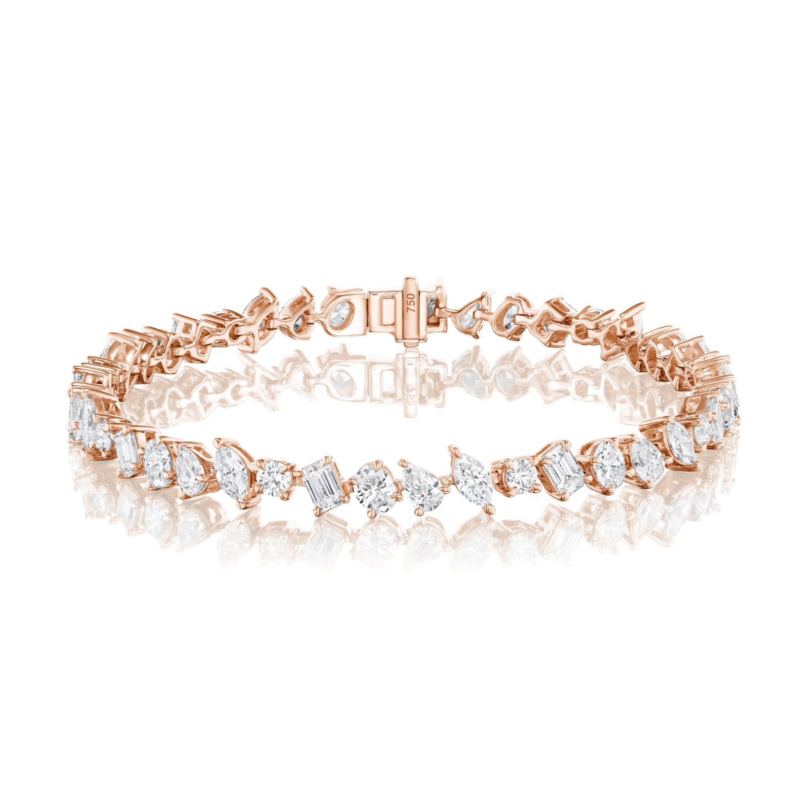 The Mixed Shape Diamond Tennis Bracelet showcases alternating oval and emerald-cut white gemstones of G-H color and SI+ clarity, set in 18k rose gold. Displayed elegantly on a white reflective surface, this expertly crafted piece embodies sophistication and timeless appeal.
