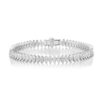 The North-South Set Diamond Marquise Tennis Bracelet in White Gold showcases SI-clarity marquise-shaped diamonds set in a continuous line within a sleek 18k white gold setting, elegantly displayed on a reflective surface.