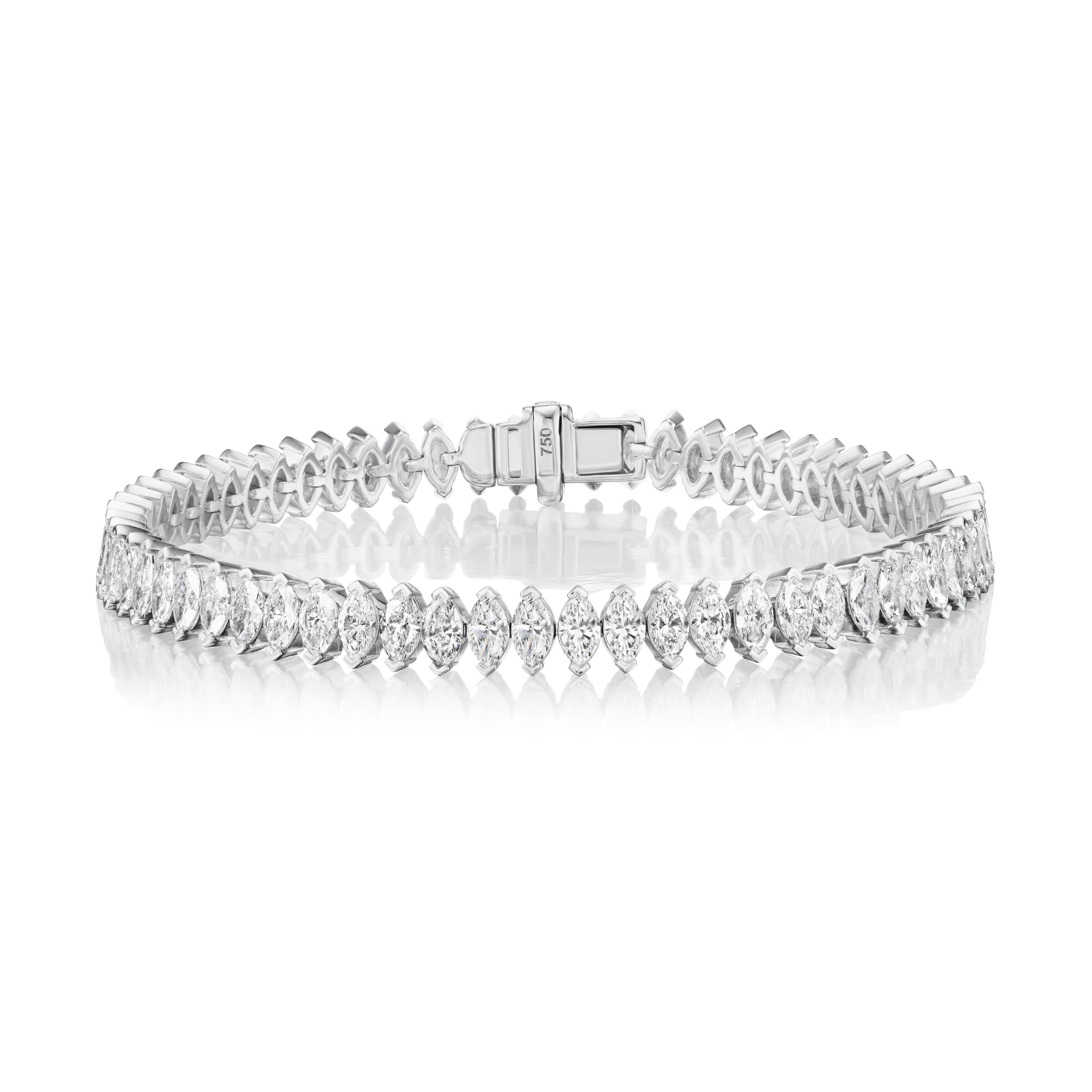The North-South Set Diamond Marquise Tennis Bracelet in White Gold showcases SI-clarity marquise-shaped diamonds set in a continuous line within a sleek 18k white gold setting, elegantly displayed on a reflective surface.
