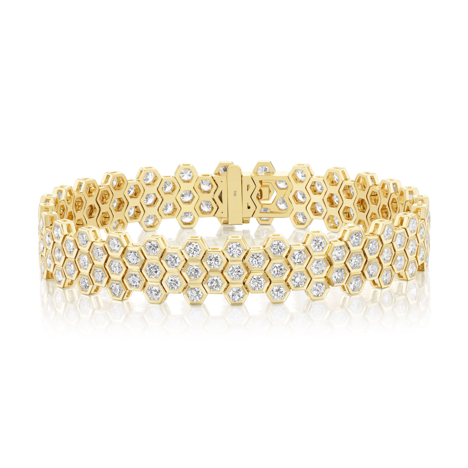 The Multi-Tier Hexagon Bezel Set Tennis Bracelet in Yellow Gold showcases a striking honeycomb pattern crafted in 18k yellow gold, adorned with small round diamonds, each bezel set to enhance brilliance. Presented on a white background.