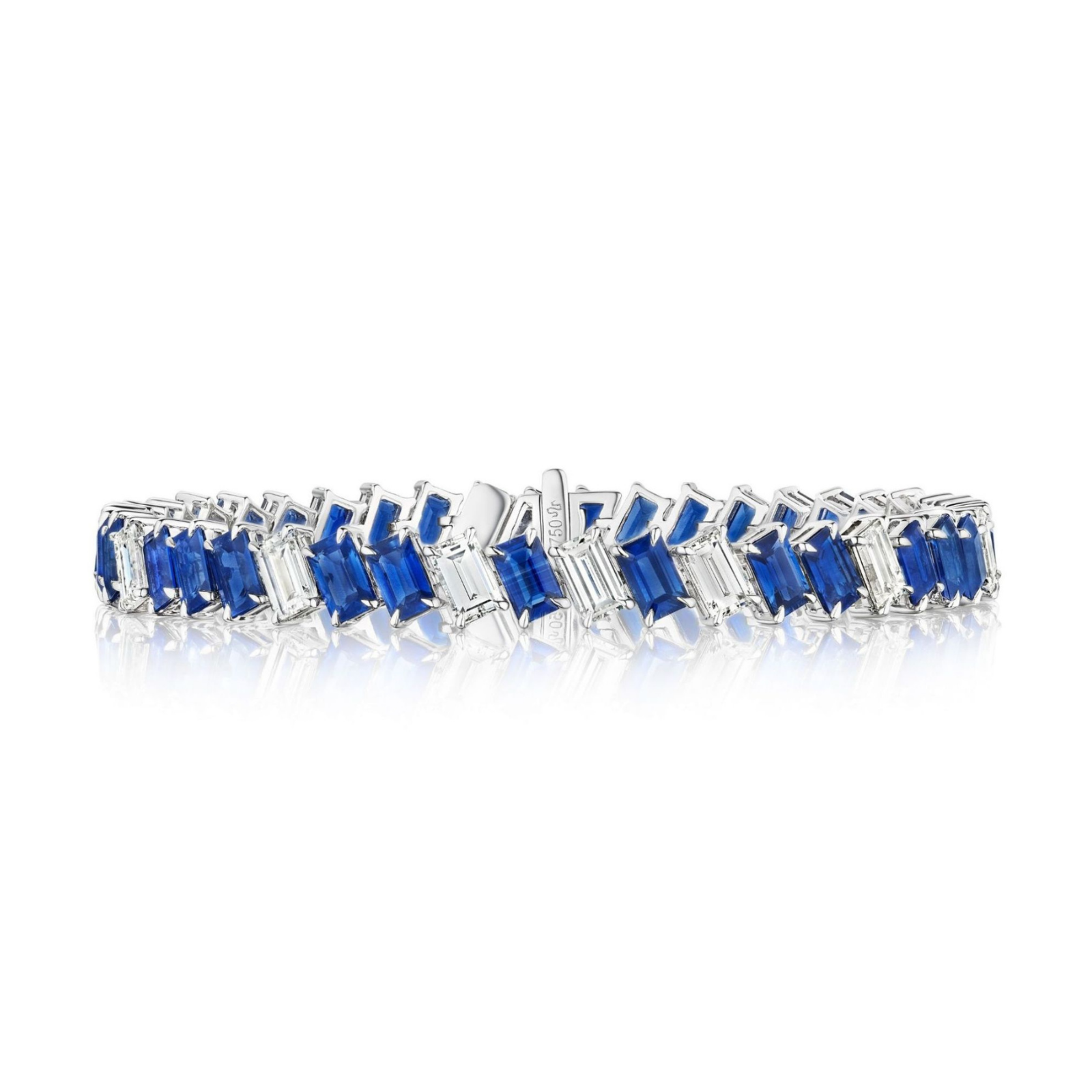 Introducing the Chroma Empire Diagonally Set Emerald Cut Sapphire and Diamond Tennis Bracelet: a breathtaking 18k white gold bracelet adorned with alternating emerald cut sapphires and sparkling diamonds, elegantly arranged in a diagonal pattern that echoes the timeless style of a classic tennis bracelet, beautifully showcased on a white background.