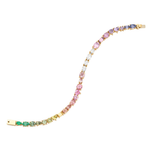 Introducing the Mixed Shape Diamond and Multicolor Sapphire Tennis Bracelet, showcasing a stunning array of round, multicolored sapphires—gracefully transitioning from green to yellow, pink, white, and blue—artfully set in 18K yellow gold.