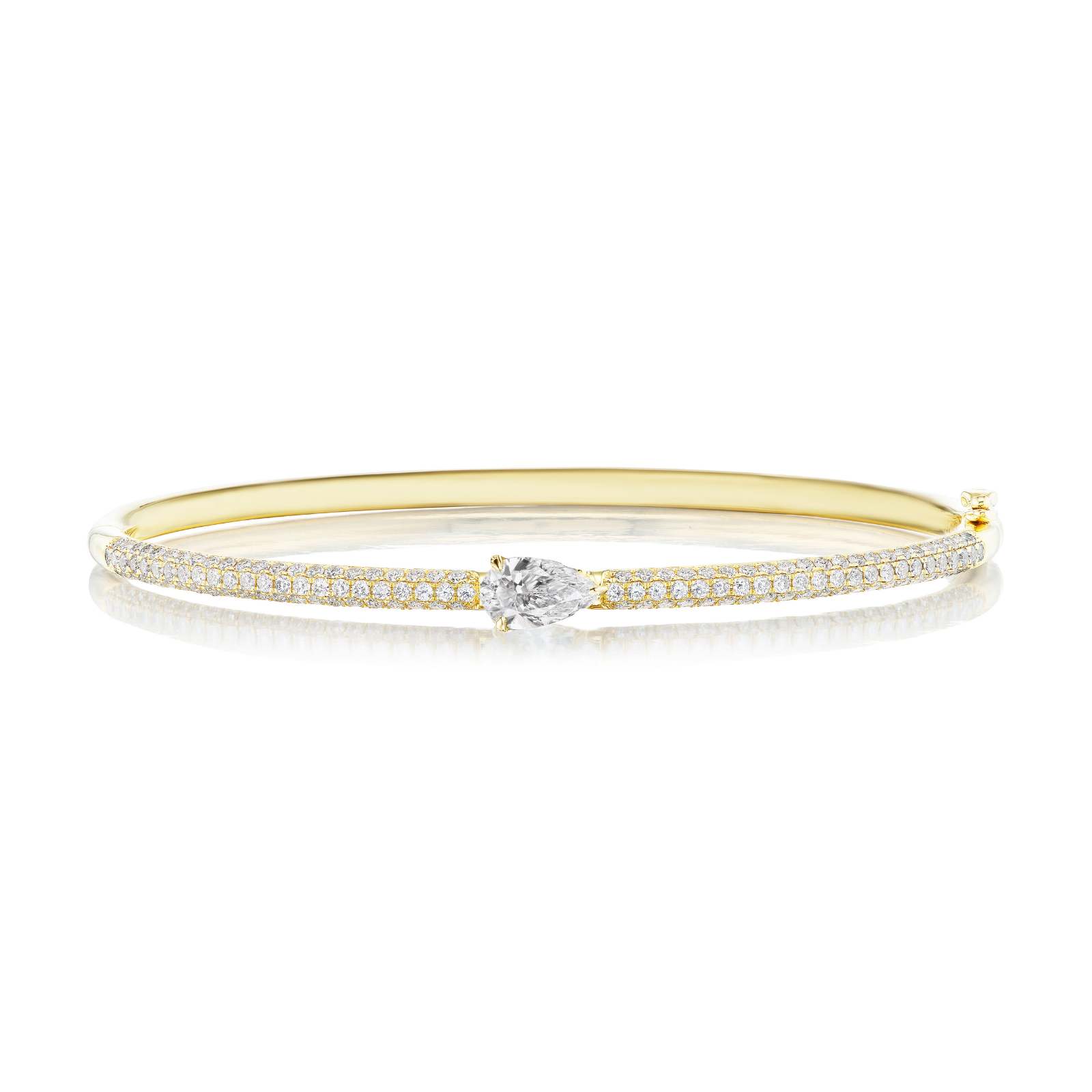 The East-West Set Pear Shape Diamond Pavé Bangle, crafted in 18k gold, features two rows of pavé-set small diamonds and a striking pear-shaped diamond centerpiece, elegantly displayed on a white background.
