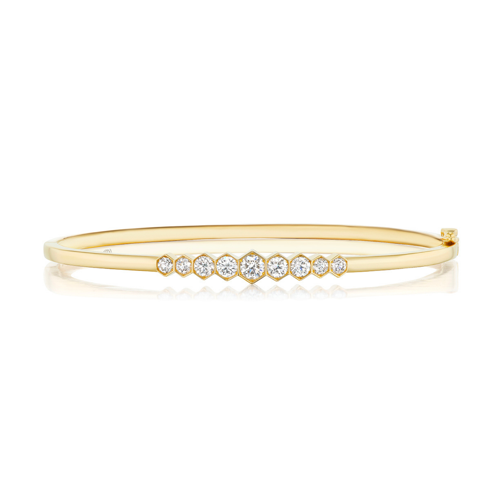 A sleek 18k gold Graduated Hexagon Bezel Set Diamond Bangle featuring a row of round white diamonds in a symmetrical hexagonal bezel setting along the front, displayed against a white background—an elegant reinterpretation of the classic diamond bracelet.