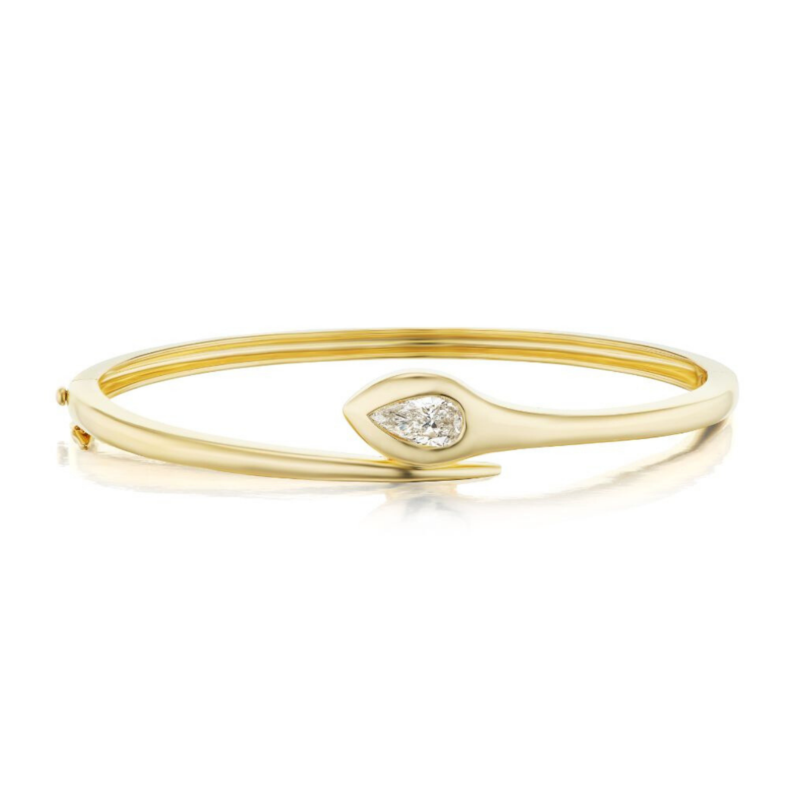 Introducing the Serpent Pear Diamond Bangle—a modern, slightly tapered bangle crafted in sleek 18K yellow gold and accented with a striking pear-shaped diamond set at its center.
