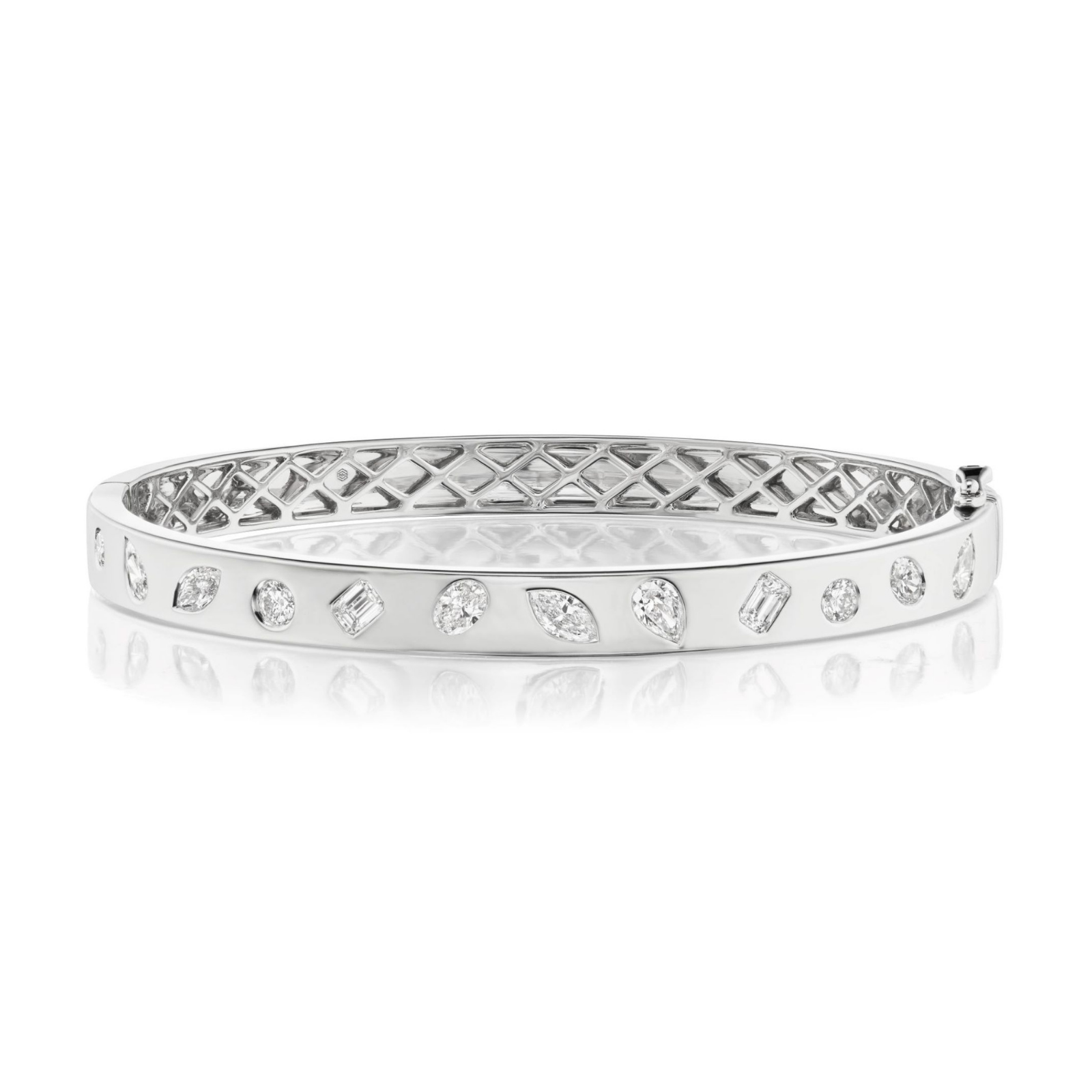 Presenting the Burnish Set Mixed Shape Diamond Bangle, crafted in 18K gold and adorned with an array of mixed shape diamonds encircling the band, showcasing an intricately designed lattice pattern on the inner side.