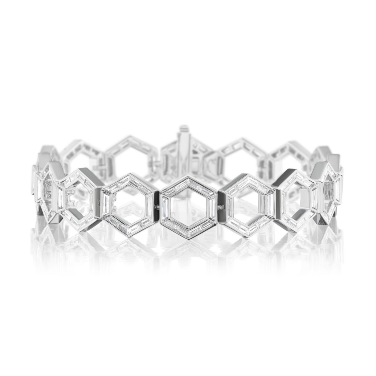 Presenting the Chrysler Hexagon Diamond Bracelet in White Gold, a captivating piece showcasing a repeating hexagonal honeycomb motif adorned with dazzling baguette diamonds, elegantly displayed on a white background with a reflective surface.