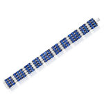 Introducing the Sapphire and Diamond Striped Evening Bracelet: a silver bracelet showcasing alternating rows of blue sapphires and clear diamonds in a striking geometric checkerboard pattern, reminiscent of a classic sapphire tennis bracelet.