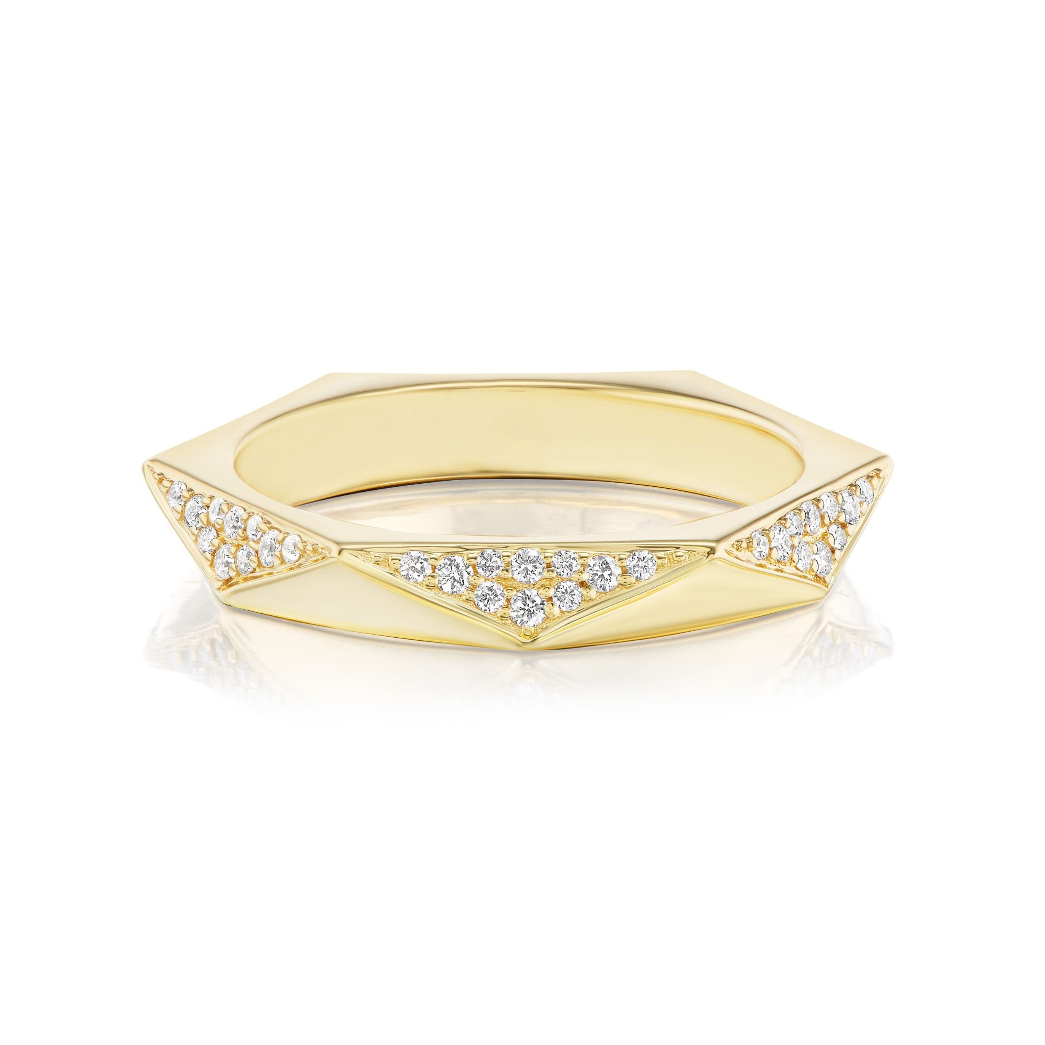 The Triangular Geometric Pavé Band is a modern 18k gold ring with angular facets and sparkling diamonds set in triangular patterns, featuring a sculptural, polished design for a striking contemporary look.