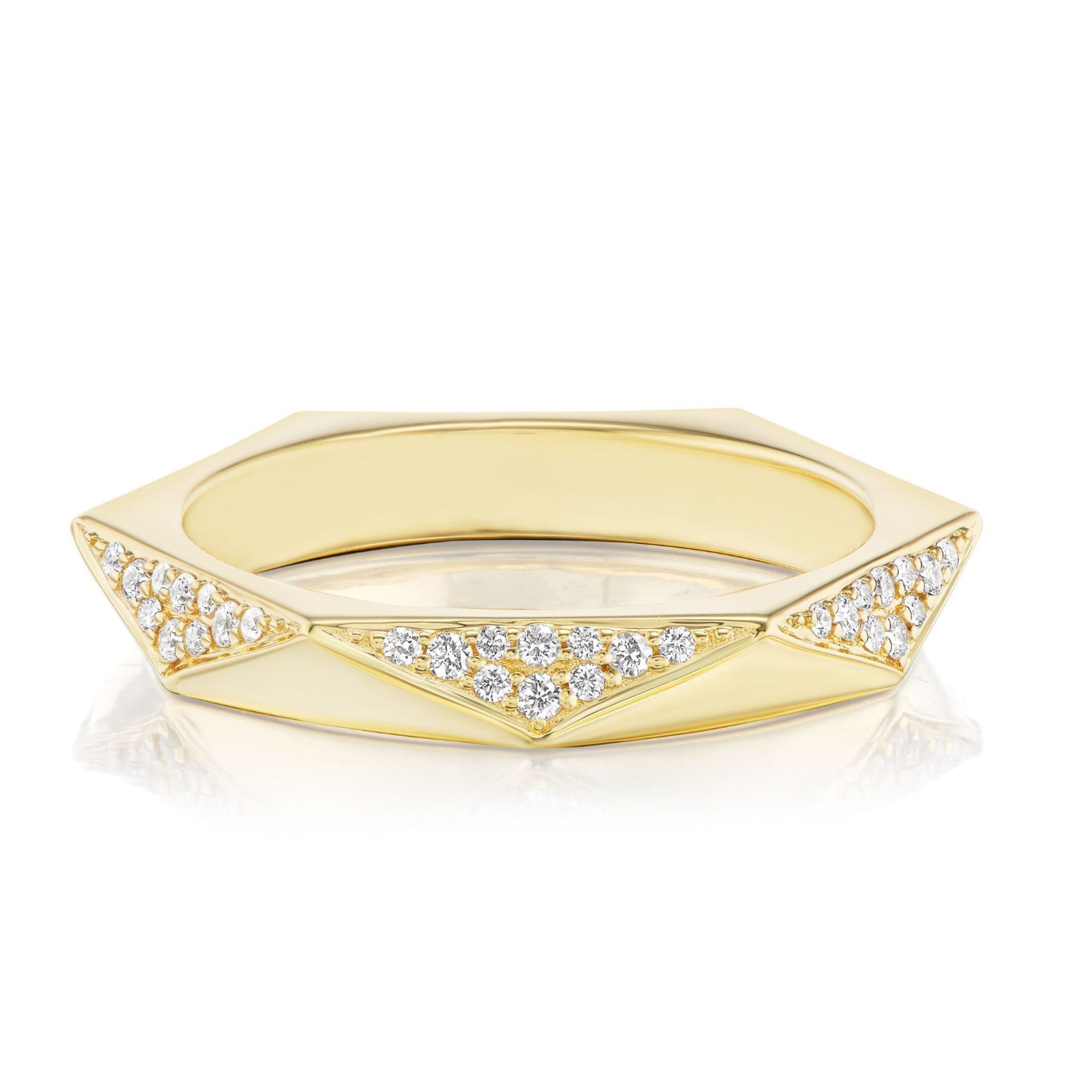 The Triangular Geometric Pavé Band is an 18k gold ring with angular edges and SI clarity diamonds set in triangular pavé patterns along the band.