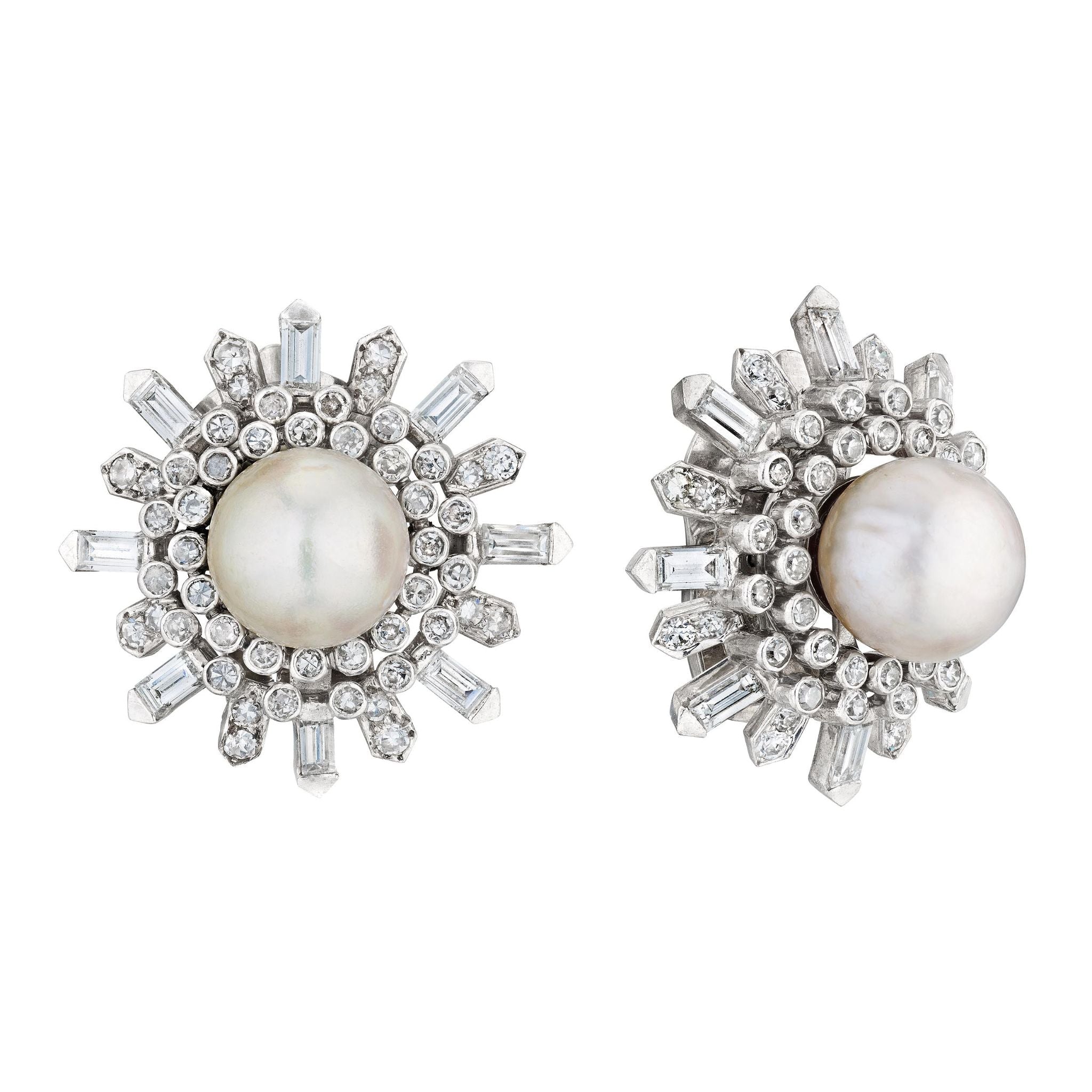 Van Cleef & Arpels Pair of Pearl and Diamond Earclips: round pearls center a starburst of diamonds and baguette-cut stones in white metal, echoing timeless vintage 1960s elegance.