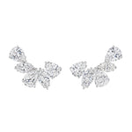 Pair of Diamond Earclips, inspired by marquise diamond earrings, each features five clustered pear-shaped clear gemstones arranged in an elegant fan-like design.