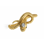 An antique gold bracelet designed in the shape of a coiled snake, featuring detailed scale work, a round diamond set on the snake’s head, and two small emeralds for eyes. The graceful coils create an elegant and striking piece.