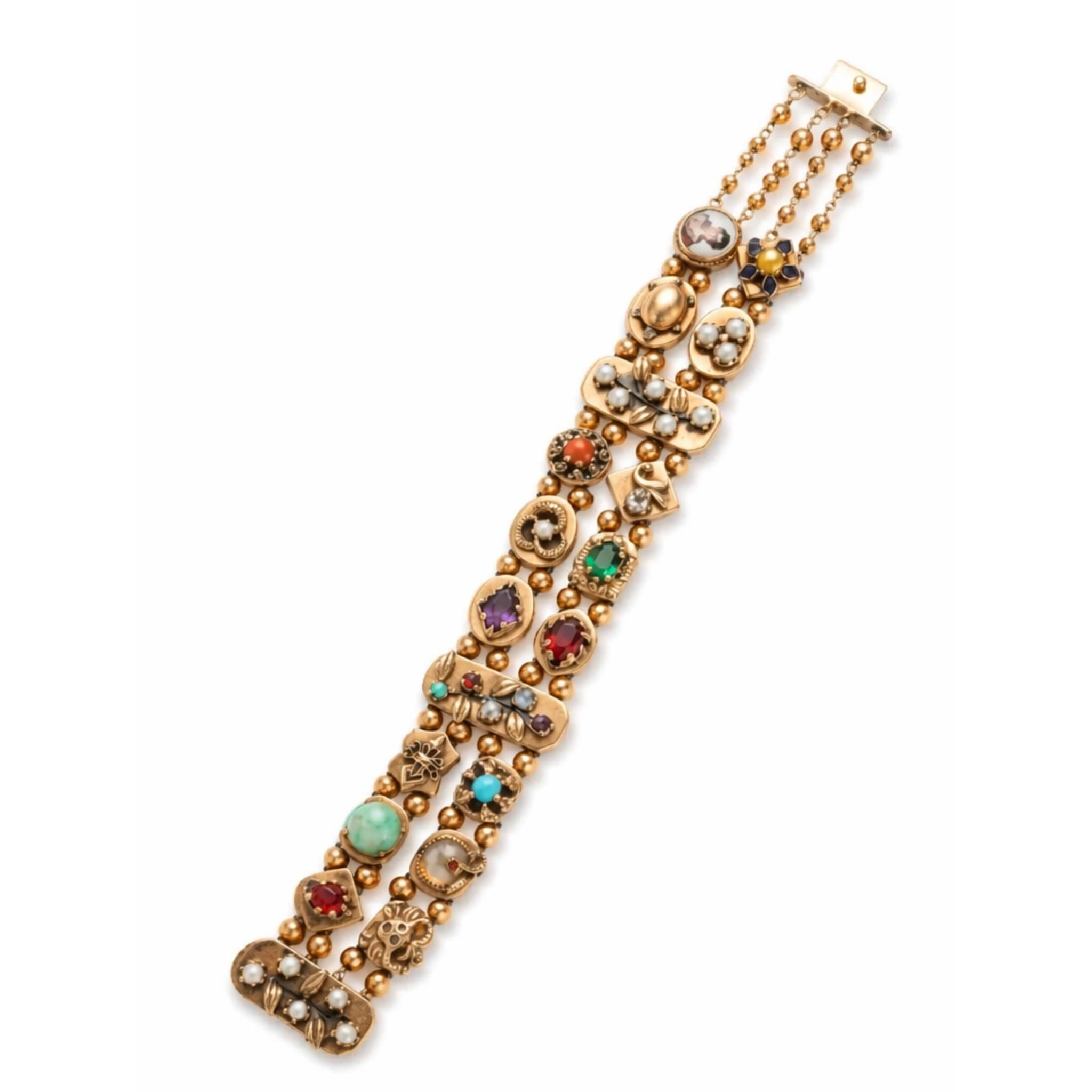 The Colored Stone and Diamond Bracelet is a striking 14K yellow gold piece with round and oval settings, colored stones, pearls, diamonds, and ornate details arranged in three parallel rows—a standout vintage design.