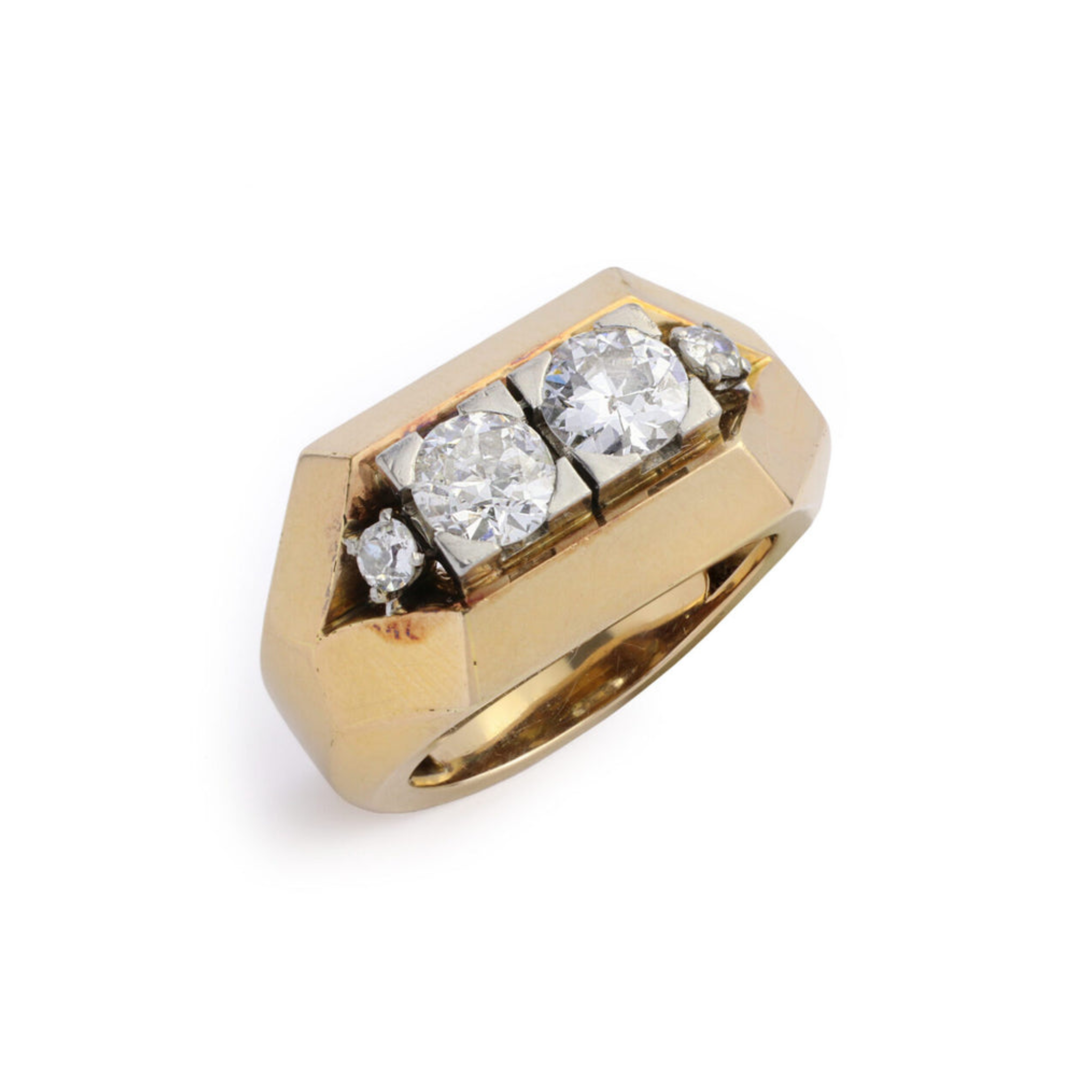 The Mauboussin Gold and Diamond Ring features a geometric design in platinum and 18K white gold, with two large central round diamonds and smaller side diamonds, all set against a white background.