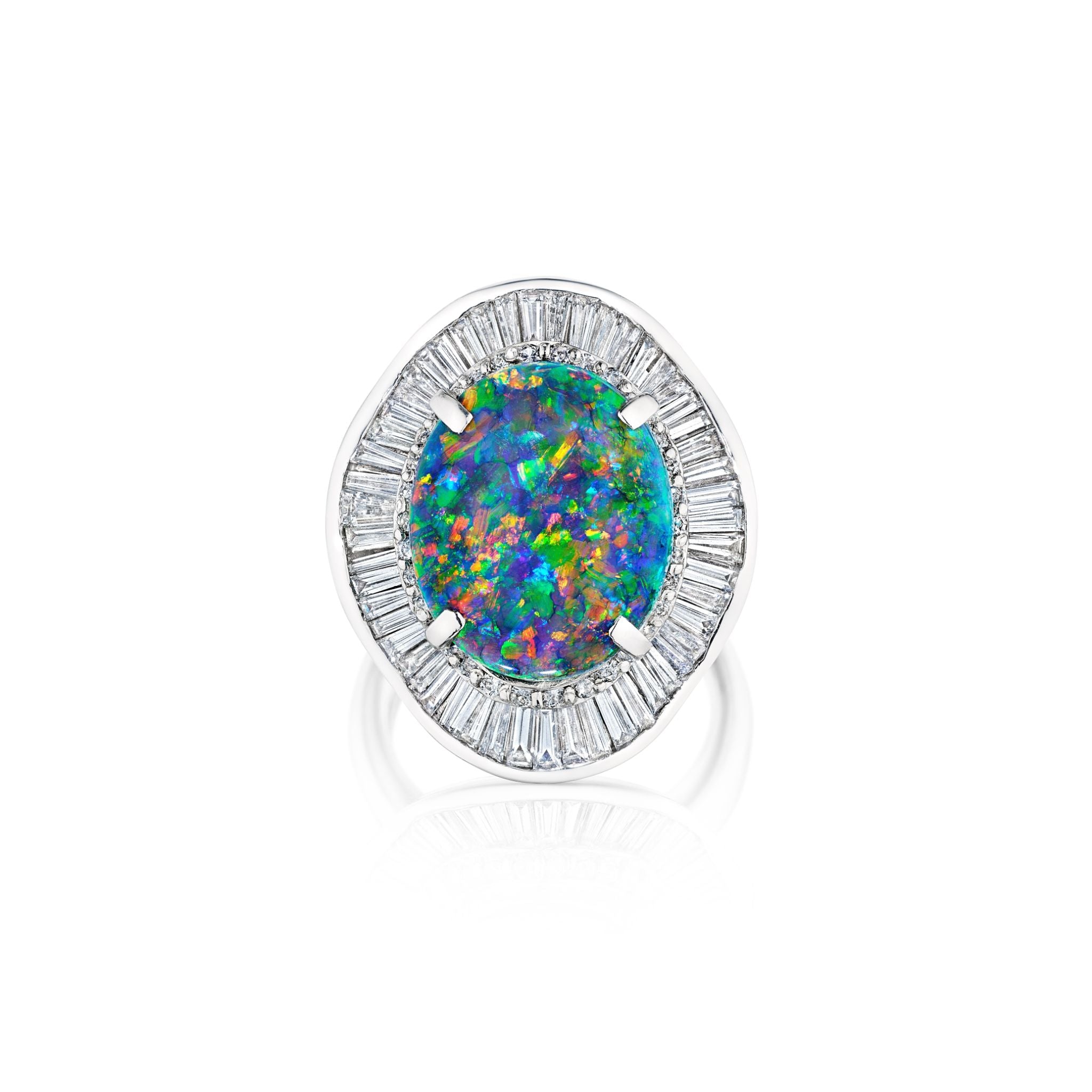 The Opal and Diamond Ring features a large round multicolored opal center stone surrounded by a sparkling halo of baguette diamonds, all set in platinum.