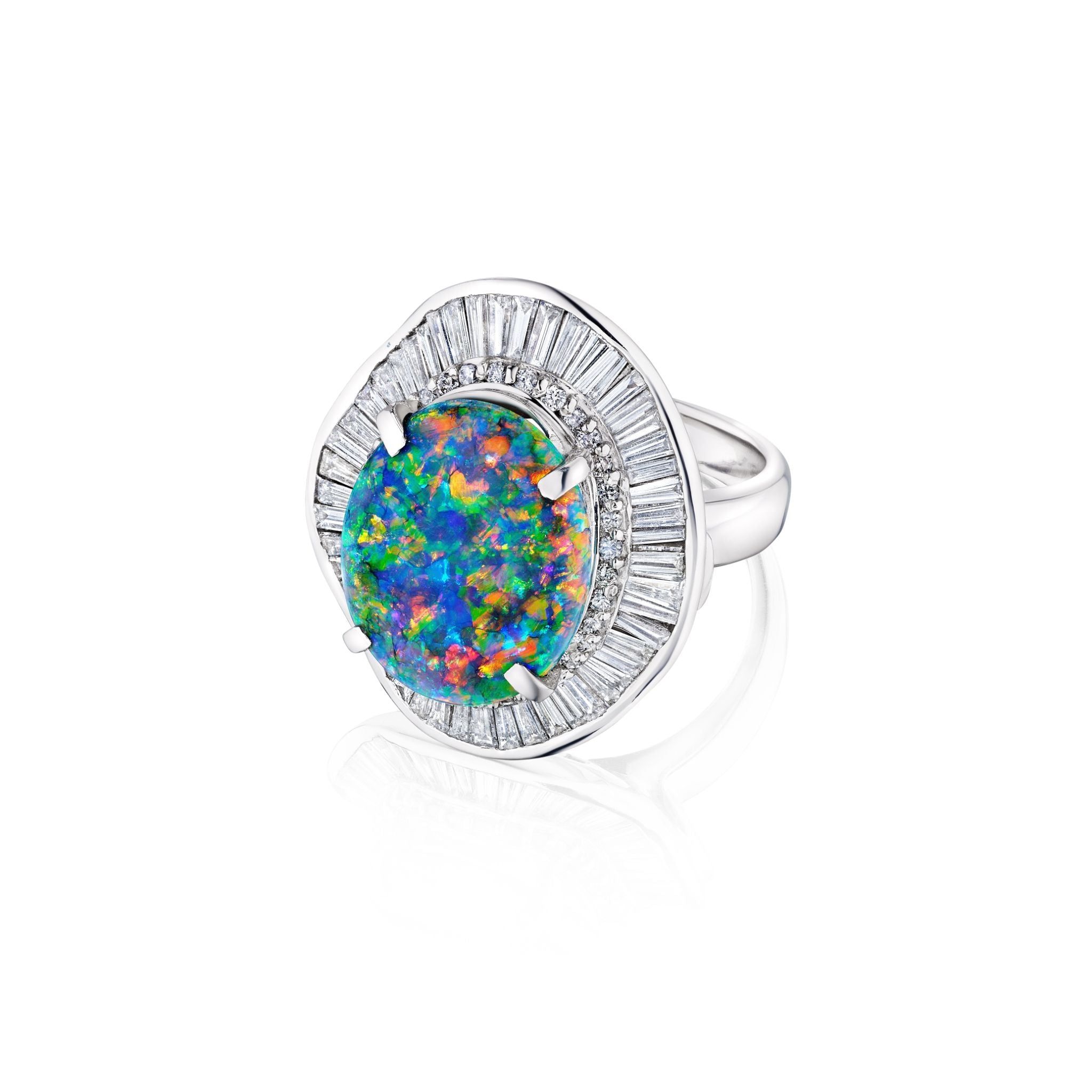 The Opal and Diamond Ring showcases a large oval opal with vibrant blue, green, and orange hues, surrounded by a halo of baguette diamonds in a modern platinum setting.