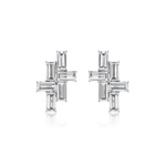 The Tetris Studs with Baguette Diamonds in White Gold feature a geometric cross design with rectangular baguette-cut clear gemstones totaling 2.50ctw, set in polished 18K white gold against a white background.