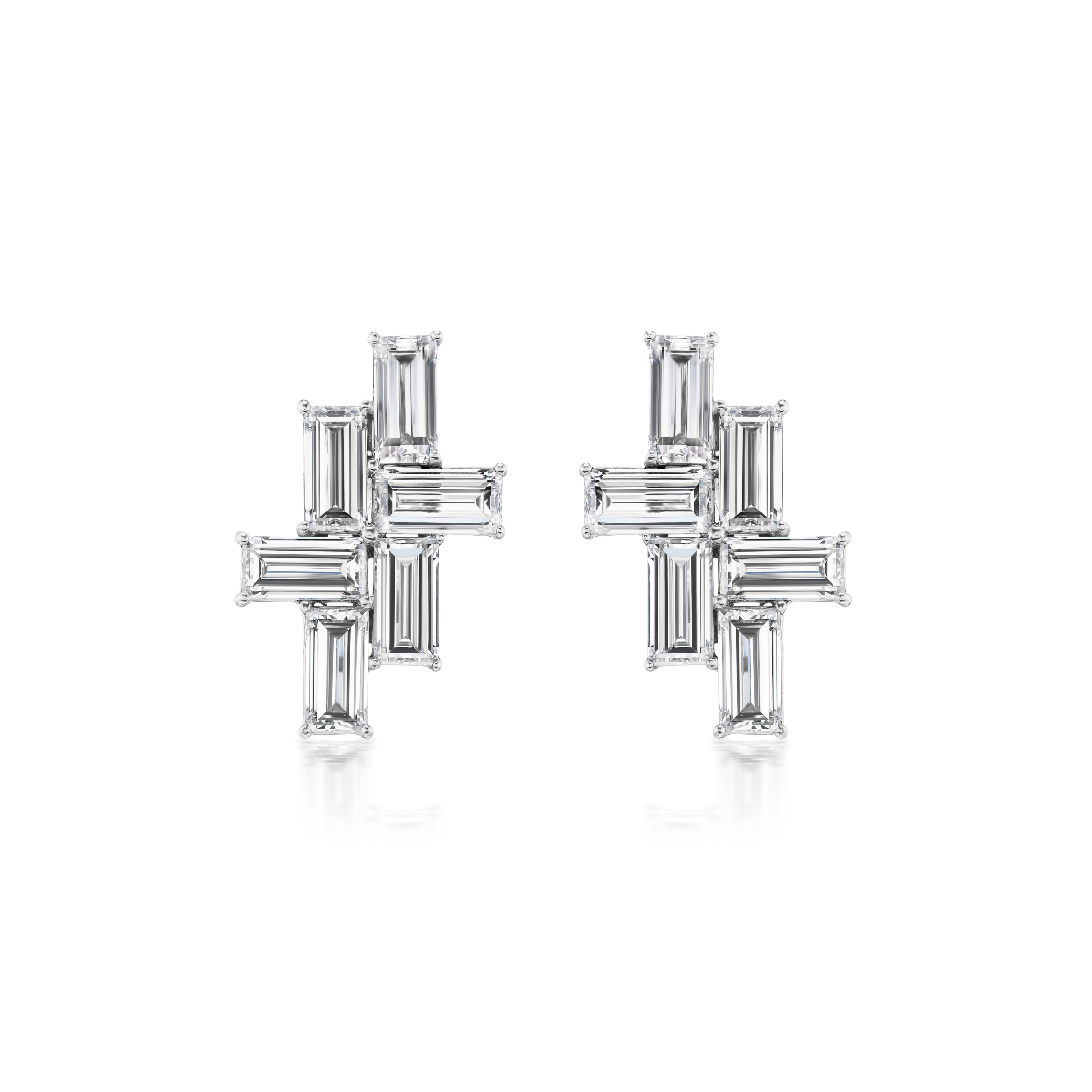 The Tetris Studs with Baguette Diamonds in White Gold feature a geometric cross design with rectangular baguette-cut clear gemstones totaling 2.50ctw, set in polished 18K white gold against a white background.