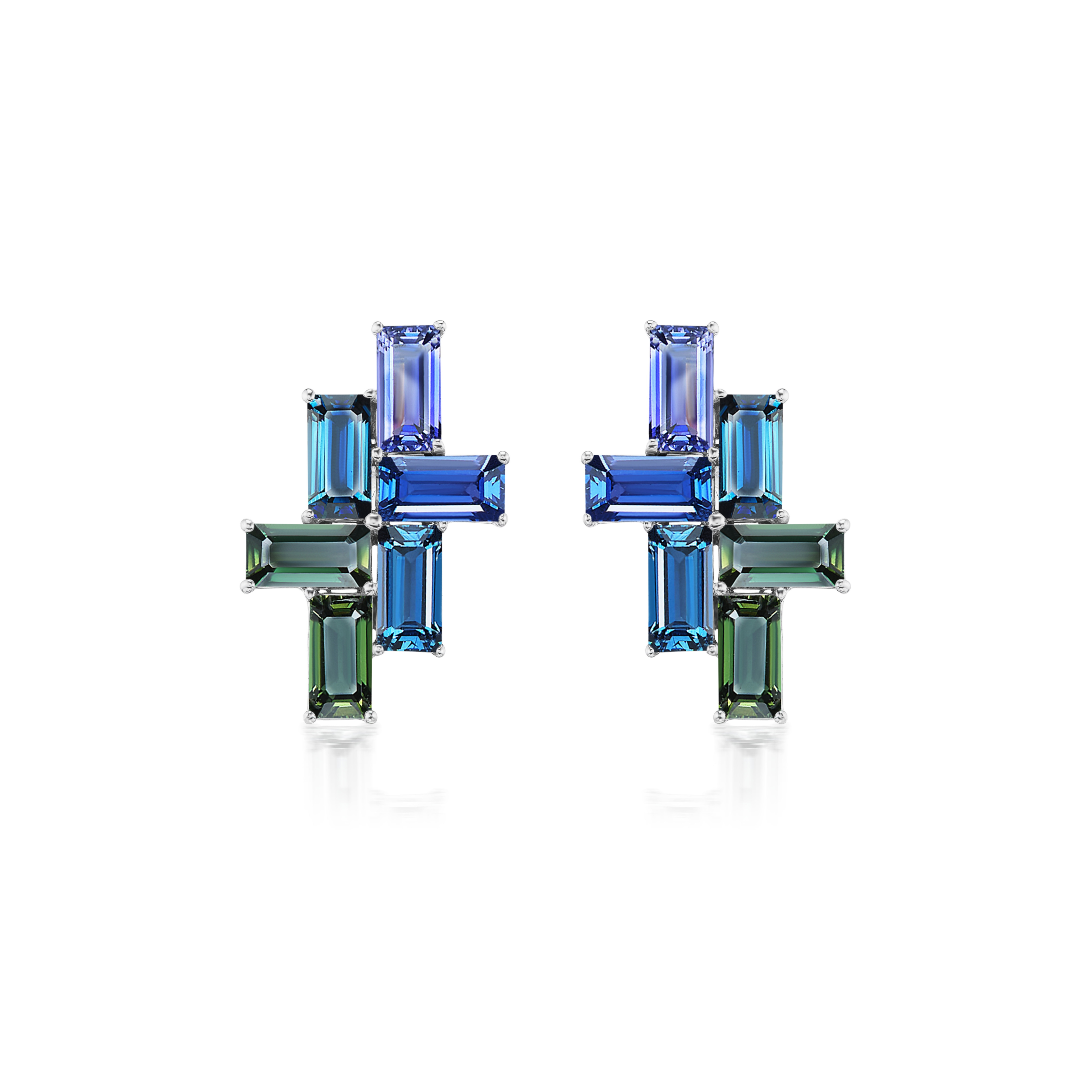 The Multicolor Tetris Studs feature rectangular blue and green baguette sapphires arranged in a cross pattern, set in 18K white gold.