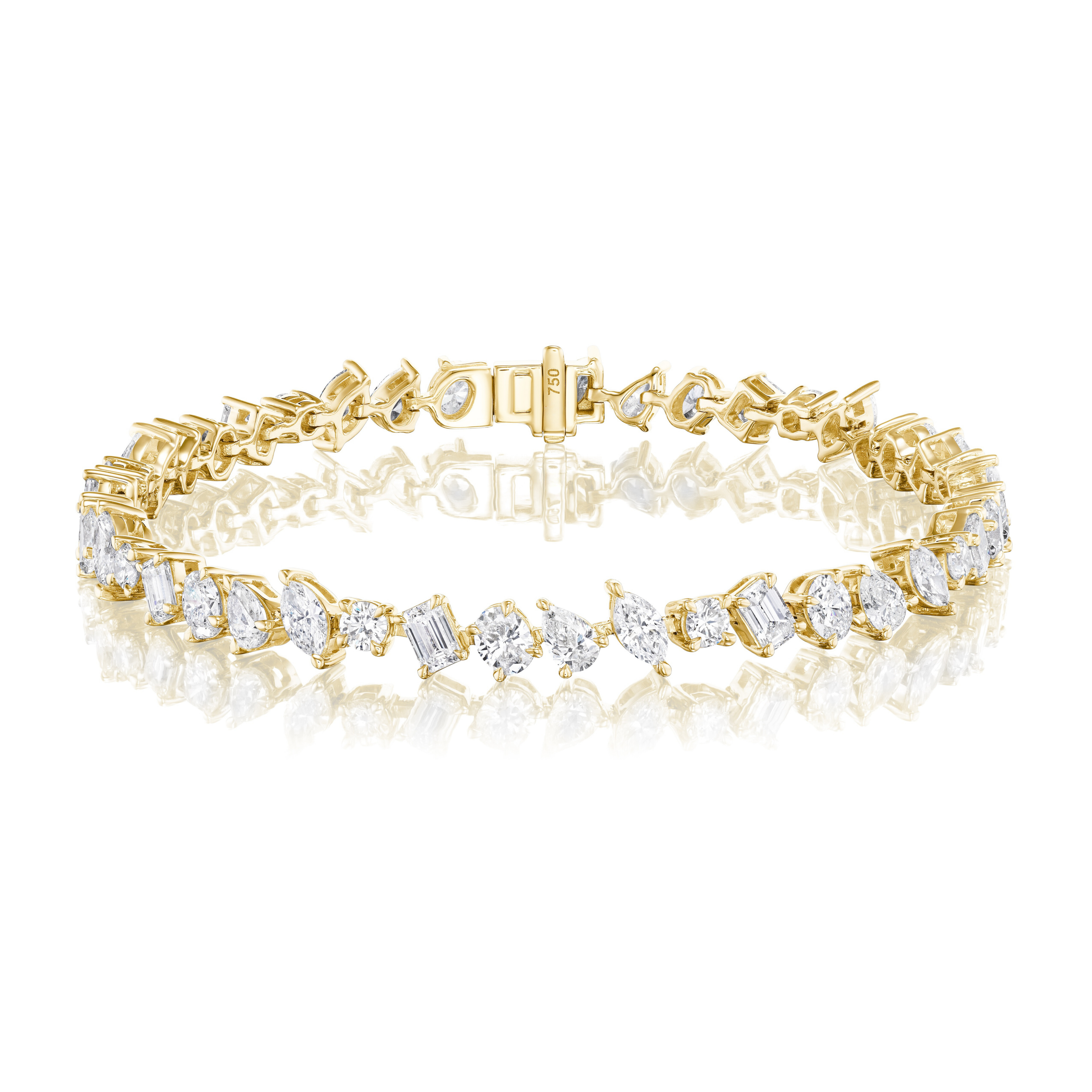 The Mixed Shape Diamond Tennis Bracelet in 18k gold features a clasp and alternating round and baguette-cut diamonds set in a single row, displayed on a white reflective surface.