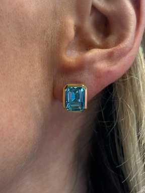 Bezel Set Emerald Cut Aquamarine Stud Earrings in Yellow Gold